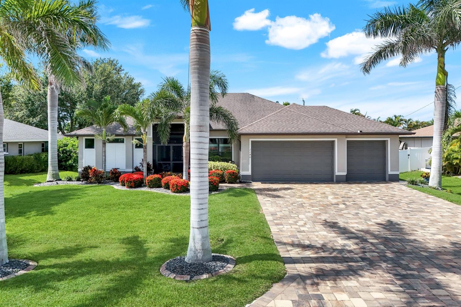 Your Southwest Cape Coral Pool Home Oasis Awaits! Welcome to your stunning pool home nestled in the highly desirable Southwest section of Cape Coral. This extraordinary residence offers the perfect combination of style, comfort, and location—with close proximity to top-rated restaurants, shopping, and entertainment. Step inside to discover a beautifully designed interior featuring new Bamboo Vinyl Plank flooring throughout and soaring 12-foot ceilings that create a bright, open feel. The heart of the home is the chef’s kitchen, complete with upgraded granite countertops, glass subway tile backsplash, Maytag oven with air fryer, and Maytag dishwasher—ideal for entertaining. The split floor plan ensures privacy, with the spacious Primary Suite offering a tray ceiling with crown molding, sliders to the lanai, and a luxurious ensuite bath featuring a frameless glass shower door, rain showerhead, decorative glass listello, and dual vanities with granite countertops. Enjoy the best of Florida living with seamless indoor/outdoor transitions through pocketing sliding glass doors leading to your expansive pavered lanai. Entertain in style under the truss-covered outdoor living and dining area, complete with a wet bar featuring granite counters, a mini-fridge, sink, and 4-stool bar. Your saltwater heated pool is a true showpiece, recently resurfaced and tiled, with sun shelf and bubblers, LED lighting, a newer pool cage with Super Screen, and advanced Nano Salt Purification system. The fenced, impeccably landscaped yard offers privacy and tranquility, enhanced by custom lighting for enchanting evenings outdoors. Additional upgrades and features include: Impact windows, Storm Smart hurricane screen across the lanai, New A/C condenser, New insulation above garage, Leaf Filter rain gutters, and Duromax XP 13000HXT generator with remote. For a full list of upgrades and features, see the attached document. Don't wait to start living your Florida dream—schedule your private tour today!