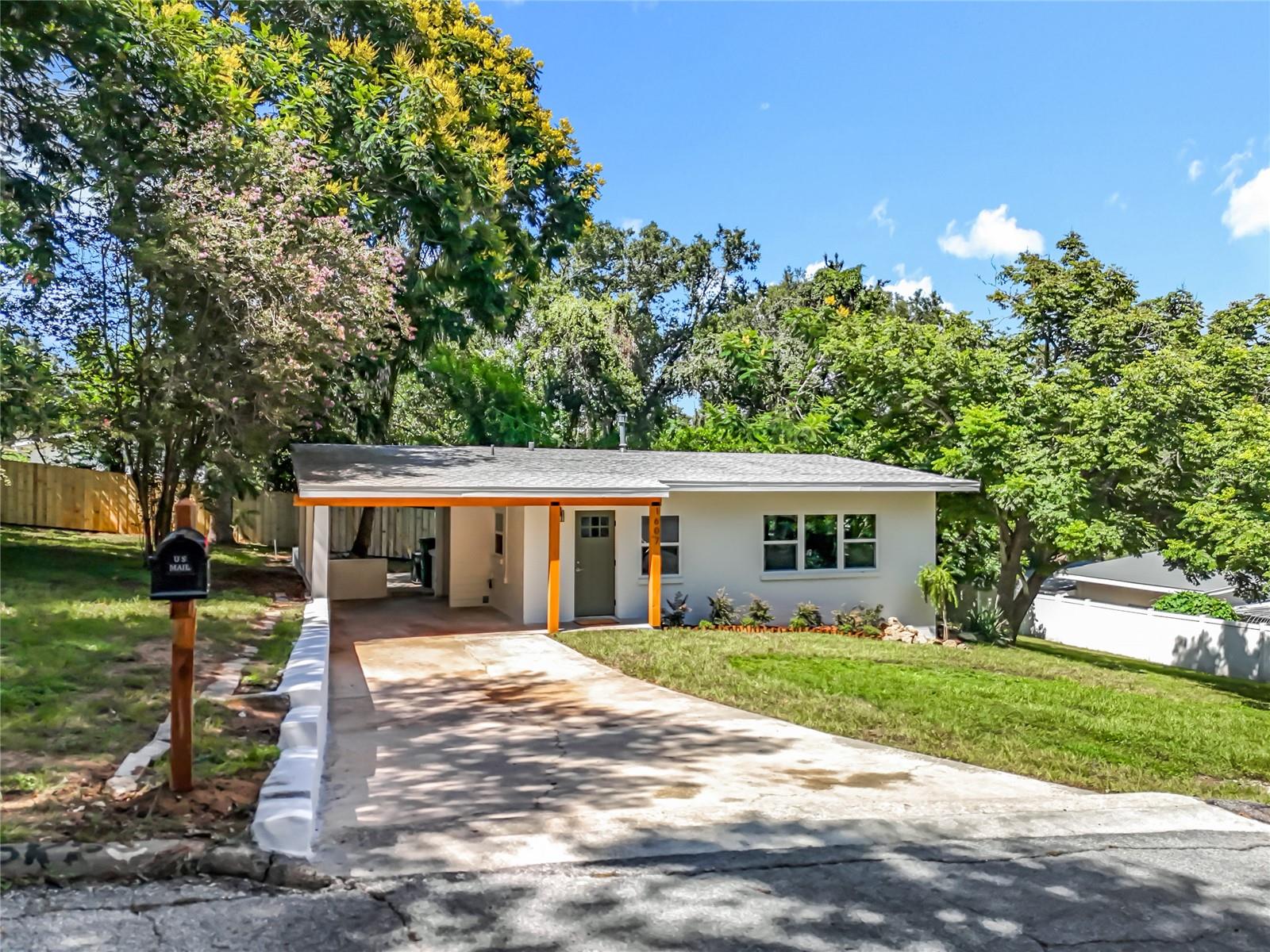 Beautifully updated home on a spacious quarter-acre lot (approximately a lot and a half) with modern farmhouse style, custom wooden beams, abundant natural light, and a stylish open floor plan designed for both everyday living and entertaining. No HOA! Enjoy mornings in your brand-new kitchen, then step outside to a generous yard with plenty of room for recreation, gardening, pets, or weekend BBQs! Updates include huge savings with new windows (2025), roof (2023), septic and drainfield (2025), electrical and plumbing (2025), AC (2018), and brand-new appliances. The kitchen offers modern finishes and flows into the living and dining areas, perfect for shared meals or hosting friends and family. Just minutes to downtown Eustis, Ferran Park’s lakefront, and charming Mount Dora for shopping, dining, parks, and waterfront activities. All the work has been done—simply unpack and enjoy.