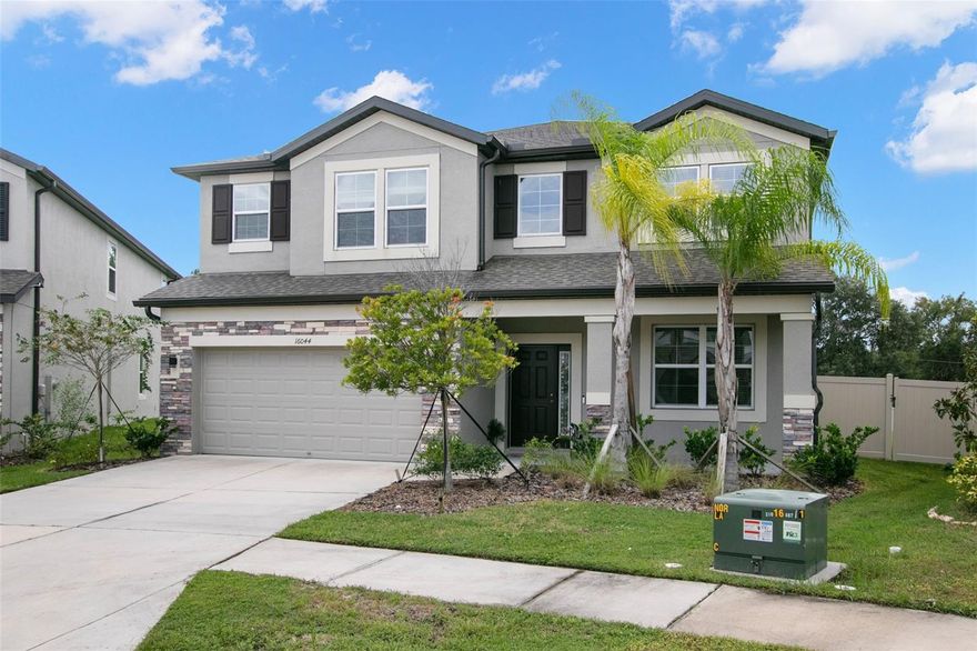 Welcome to luxury living in highly desirable Morris Bridge Manor — this nearly new, two-story residence offers 5 bedrooms, 3 full baths, a 3-car tandem garage, and over 3,500 square feet of crafted living space. Thoughtfully designed for modern families, entertaining, and a comfortable Florida lifestyle w/ one of the largest oversized pie shaped lots in the community! Upon entry the foyer leads into flexible living areas and flows seamlessly into the great room, dining, and kitchen w/ beautiful solid surface Luxury Vinyl Plank flooring throughout! High ceilings, large windows, and natural light create an airy, welcoming ambiance. Central gourmet kitchen with a large island, granite countertops, espresso-stained cabinetry, stainless steel appliances, a butler pantry space and generous walk-in pantry. Perfect for cooking and entertaining. *FIRST FLOOR GUEST SUITE - Ideal for family or visiting guests, a full bedroom and bath are located on the ground level behind the great room for added convenience and privacy. All other bedrooms (including the Primary) are located upstairs + an additional bonus room retreat w/projection screen & home office/den. The primary suite offers double door entry & a spacious 22×16 oasis with views of the pond! The ensuite includes dual vanities, a walk-in shower, private toilet & an expansive walk-in closet. Three additional bedrooms are located upstairs, sharing a well-appointed full bath & ample walk-in closet space. The 3rd car tandem garage is equipped w/ fitness equipment, treadmill & static bike for your own in home gym experience! Sliding glass doors open to the sprawling oversized, fully fenced backyard offering tons of green space & beautiful pond views!
Conveniently located just minutes from shopping, restaurants, running & biking trails with close proximity to I-75, I-4 & I-275, making commutes easy to downtown Tampa, Tampa International Airport, and all Tampa Bay has to offer! *LAWN & PEST CONTROL INCLLUDED!*
