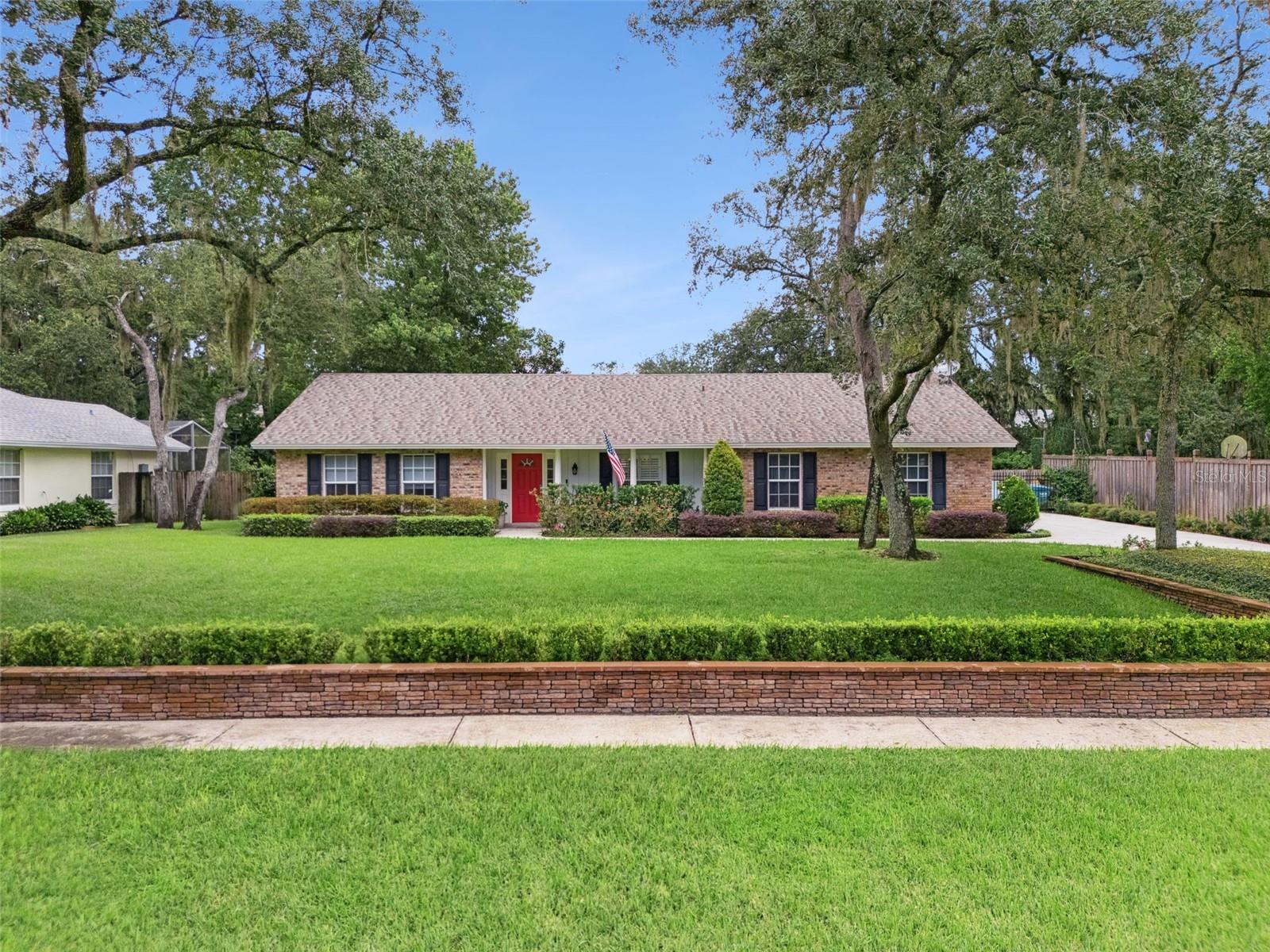 Welcome to 1118 Winter Springs Blvd, a beautifully maintained home that combines elegance, comfort, and modern updates throughout. This residence features high-quality luxury vinyl plank flooring and crown molding, impact windows with plantation shutters, and a formal living room that can easily be converted into a 4th bedroom. The vaulted ceilings create a spacious feel, while the updated kitchen boasts quartz countertops and tall solid-wood cabinets, complemented by updated bathrooms. A custom addition great room showcases pine shiplap and its own brand-new custom A/C unit, perfect for gatherings. Major updates include a roof replaced in 2024 and central A/C replaced in 2021. The backyard is a true retreat with a custom-built shed, a premium wood deck, outdoor sound system, lush lawn and gardens maintained with a well-fed irrigation system, and full fencing for privacy. Additional features include a recent exterior paint job, smart thermostat, Ring doorbell camera, five Blink cameras, and a beautifully landscaped front yard that enhances curb appeal. This move-in ready property blends timeless details with modern convenience in the heart of Winter Springs.