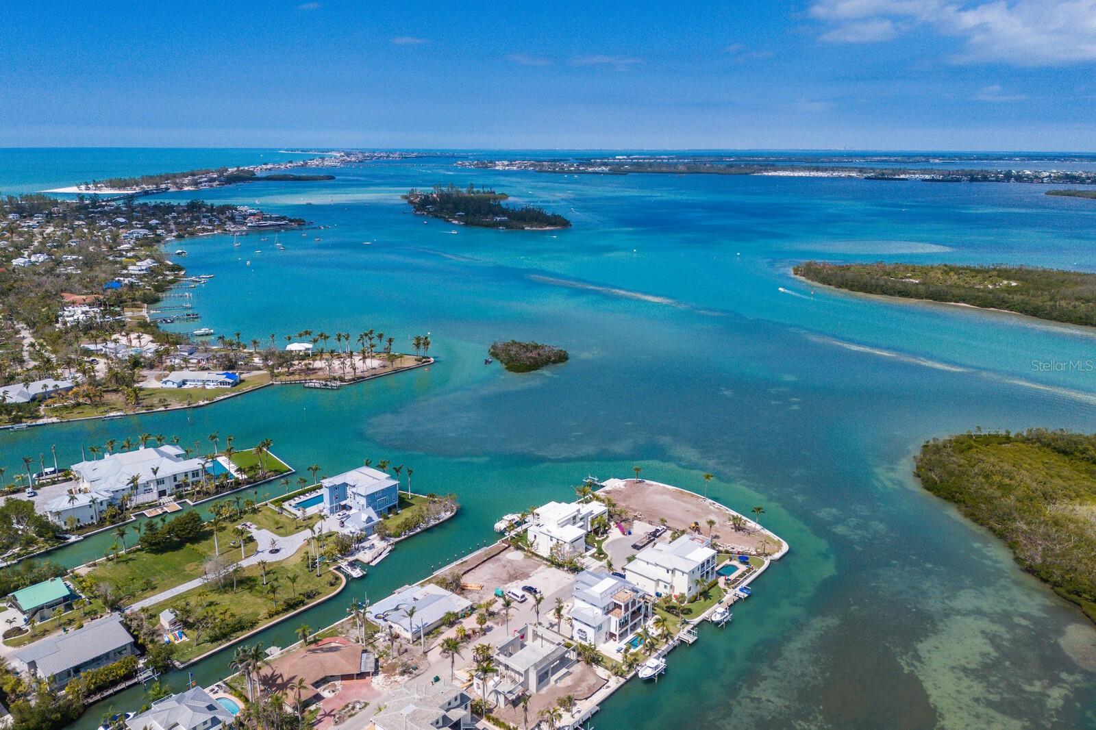 Seller Financing. Let's be creative! Prime 100' Longboat Key waterfront lot; great boating; and steps to neighborhood beach access. Seller will finance. Whether building for yourself, building for spec, or holding as an investment, Seller is flexible on terms. This prime waterfront lot features new 100' concrete seawall, 20,000-pound boat lift, and open water views. Two in from the bay, this property offers endless opportunities with views of the bayou, Sarasota Bay, and Intracoastal Waterway. Great boating with ideal north Longboat Key location, direct bay access, no fixed bridges, and a number of close by boat-accessible waterfront restaurants. Kayakers and paddleboarders alike will also appreciate the quiet, well protected waters of the Bayou and nearby Sister Key. And if it is not a day "on" the water, how about a day "in" the water with your neighborhood beach access just steps away - and Longboat Key's miles of endless gorgeous sand beach. Creative seller financing makes this easy. Great opportunity to build on a prime Longboat Key waterfront lot where boating, beach, and dreams come true.