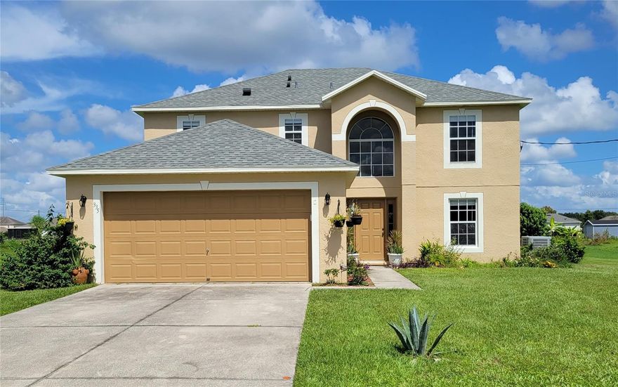 PRICE REDUCED/OWNER MOTIVATED! Winter Haven Diamond! What's to love about this turnkey gorgeous, meticulously maintained home? Well, let's start with the spacious rooms throughout both floors! Every room will provide you with the right space to decorate your new home with elegance and great taste. This beautiful 2 story 4 bedroom / 2.5 bath home with OVER HALF AN ACRE AND LOW ANNUAL HOA is truly a gem! Love to entertain? No problem! You will fall in love with your NEW KITCHEN, ALL NEW STAINLESS STEEL SMART APPLIANCES, TWO SPACIOUS PANTRIES AND GRANITE COUNTERTOP.  With 2,242sq ft this home will give you more than what you were expecting: Inside/Outside freshly painted in 2022, NEW SOLID WATERPROOF VINYL FLOORS (NO CARPET/NO ALLERGIES), NEW OUTDOOR STORAGE SHED FOR EXTRA SPACE, NEW WATER SOFTNER SYSTEM, NEW REMODELED MASTER BATHROOM and LAST BUT NOT LEAST ENTRANCE STATE-OF-ART LIGHT FIXTURE TO MAKE YOU FALL IN LOVE as you come in. This well-designed home features an enormous living room and dining area for more formal affairs. In addition, a large but cozy family room that complement the supersized eat-in kitchen which will allow interaction with family and guests for more casual gatherings. All three bedrooms are surprisingly spacious as well. The MASTER SUITE BOASTS A VAULTED CEALING WITH JACK&JILL WALKING CLOSET AND A PRIVATE BATH with BRAND NEW TILED SHOWER, TUB AND GRANITE SINK VANITY WITH LOTS OF SPACE. SEPTIC TANK - MAINTENANCE COMPLETED IN 2022. ROOF AND AC UNIT ARE ALSO FAIRLY NEW. This home is conveniently located close to shopping and provides an easy commute to the Polk Parkway, I-4, Hwy 98 and anywhere in central Florida.  You truly must see this well-maintained home to appreciate all that it has to offer!