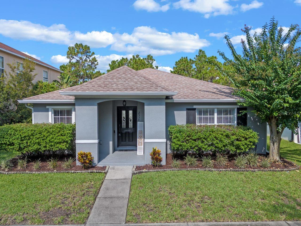 This beautifully maintained 4-bedroom, 2-bathroom home in the desirable community of Avalon Park spans approximately 1,926 square feet and features a community pool just steps away for easy summer fun. The kitchen is updated with granite countertops, stainless steel appliances and a tasteful backsplash. Enjoy a private, fenced-in backyard with tranquil conservation views from the screened-in lanai and no rear neighbors! The primary bedroom is a generously sized retreat, providing ample space for relaxation and rest while featuring a walk-in closet, ensuite with dual sinks and a walk-in shower complete with custom niche. Three additional bedrooms offer flexible space for a variety of uses, such as a home office, guest room, or personal retreat. Thoughtful updates throughout the home have been made to provide comfort, efficiency and a contemporary aesthetic. Newer blinds have been added throughout, as well as a whole home water filtration/softener system including a reverse-osmosis system in the kitchen. Newer roof installed in 2023 and a/c in 2021. Nearby downtown Avalon Park offers shops, restaurants, and year-round community events. Excellent schools (all A rated) and a beautiful neighborhood complete this amazing home. Explore nearby amenities like Waterford Lakes Town Center, or take a short drive to Disney, Universal and the beaches.