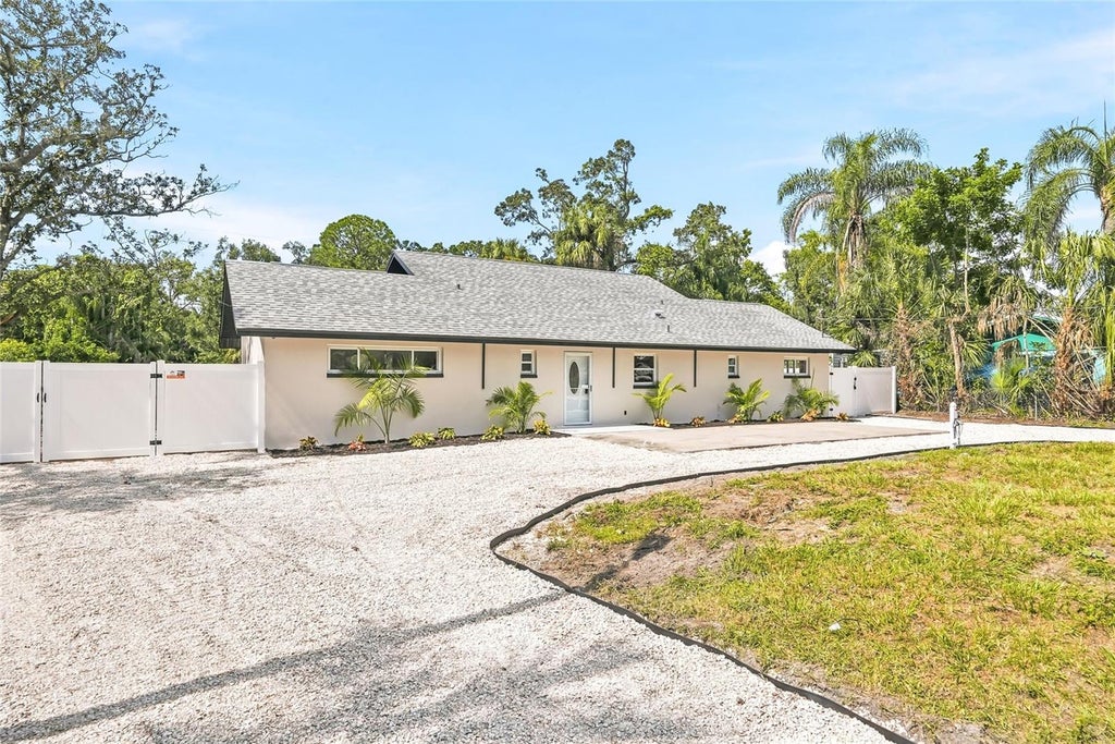 Photo of 8605 Jackson Springs Road, Tampa, FL 33615 (MLS # TB8559171)