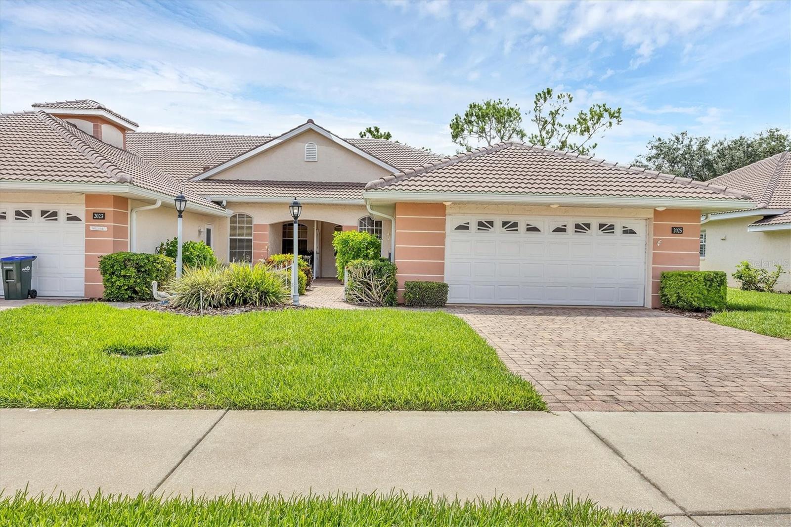A beautiful pond view, 1665 square feet of living space, end unit, 2 bed, 2 bath, plus bonus room with closet, a new tile roof, roof assessments paid in full, and beautiful laminate flooring, along with three leaded glass windows which brightens the living area, are just a few of the great features this Villa has to offer. This well maintained, tastefully decorated Villa is also being sold Turnkey and ready to move in. A new lanai and screen have just been completed. The kitchen features abundant cabinets, a pantry and island with a new granite counter top. The ample sized primary suite boasts a large walk-in closet, a double vanity and a walk-in shower. Bobcat Trail Villas are conveniently located near I-75 and US 41. It also offers easy access to medical care, restaurants, shopping, and only 25 minutes to the beach. Baseball enthusiasts will enjoy the proximity to the Spring Training facilities of the Rays and the Braves. Bobcat Trail Villa residents also enjoy amenities such as a private community pool in the middle of the Villa Community along with a larger heated community pool, Tennis and Pickleball, a fitness center and community center with a small library. Important Note: The Privately owned gulf course is currently closed.
