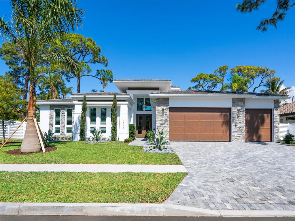 Pre-Construction. To be built. From the creative minds of the award-winning Allegra Homes team of professionals is this incredible 3,035-square-foot “Kristi Ann Modern” floor plan to be built in one of Sarasota’s most prized school districts and located just a couple of blocks to Morton’s Market and Southside Village. Well contained and beautifully appointed, this 3-bedroom, 4.5-bath luxury residence offers the very best in Florida living with its open and casually elegant spaces to enjoy. Upon entry, you’ll have a stunning see-thru view all the way to the pool. The spacious family room features a Dimplex electric fireplace and sliders leading to the covered lanai and overlooks a wonderful island kitchen with walk-in pantry and adjoining dining room with built-in buffet. The top-of-the-line appliances have cabinetry fronts and include SubZero 42” side-by-side refrigerator, SubZero 24” wine cooler, Wolf 36” cooktop, Wolf 30” oven and drop-down microwave, and ASKO Premiere quiet dishwasher. Most of your leisure time will be spent in the huge outdoor living room with kitchen while relaxing by the heated saltwater pool, 3-tier spa, sun shelf with lighted bubblers, granite pavers and screen enclosure. With 2 walls of sliders opening to the outdoor area, the versatile bonus/game room is great for entertaining and offers a wet bar, full bath and walk-in closet. You’ll appreciate all the additional amenities like a study/den with built-ins, a finished 3-car garage, professional designed landscaping and irrigation system, granite paver drive, concrete tile roof, Trane 3-zone A/C, tankless water heater, European oak floors, central vac, pool and security alarm system, closet built-ins, 10’ ceilings throughout, foyer entry, impact and low-e windows and sliding doors, and en-suite bedrooms. New and never lived in, you’ll love where you live!Home will be finished approx. April 2023**Photos are from a previous home, selections and floor plan may vary.**