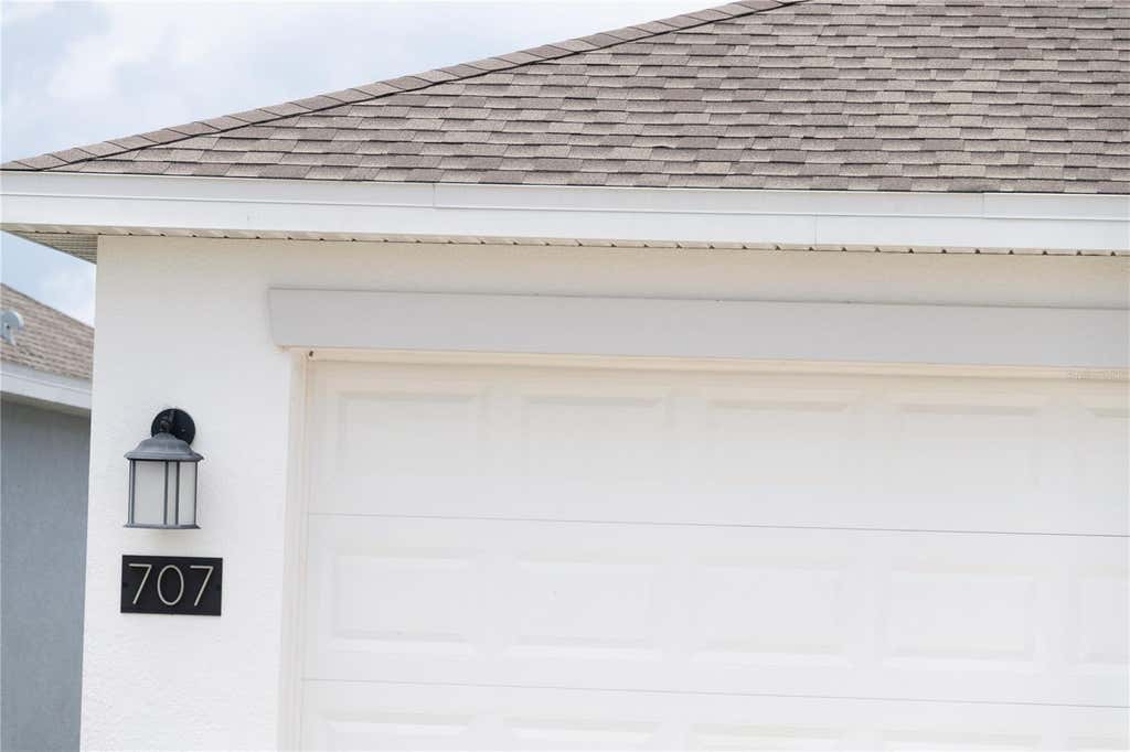 Photo of 707 Staffora Street, Haines City, FL 33844 (MLS # O6425382)