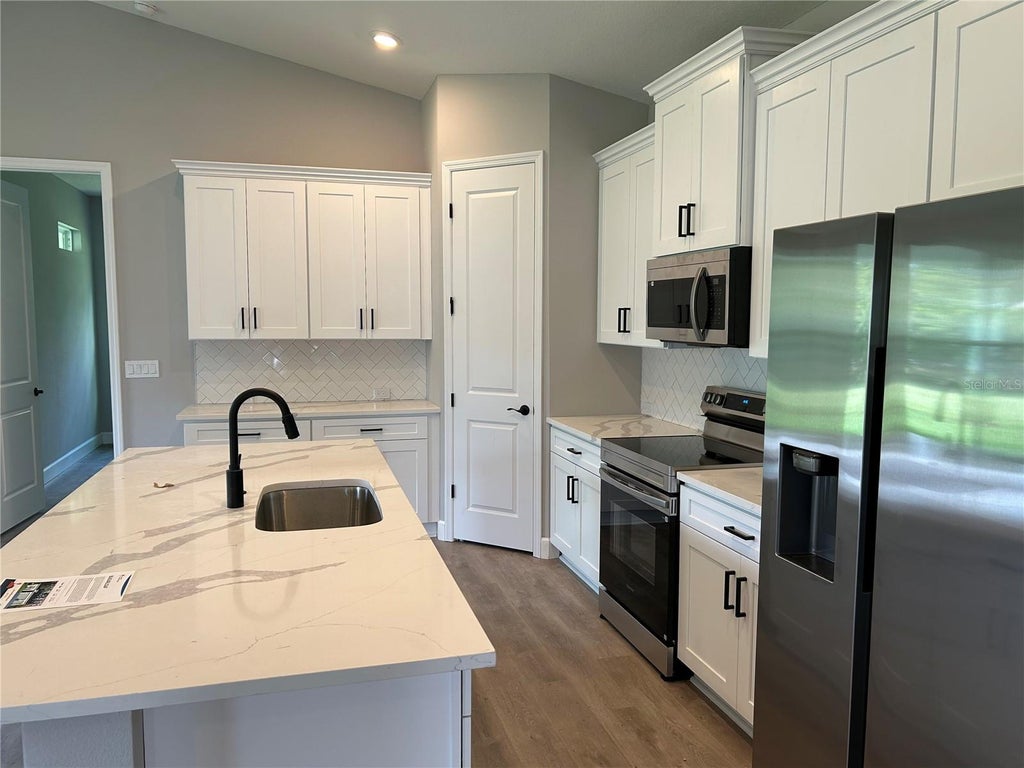 Photo of 7919 N Tiny Lily Drive, Dunnellon, FL 34434 (MLS # P4939876)