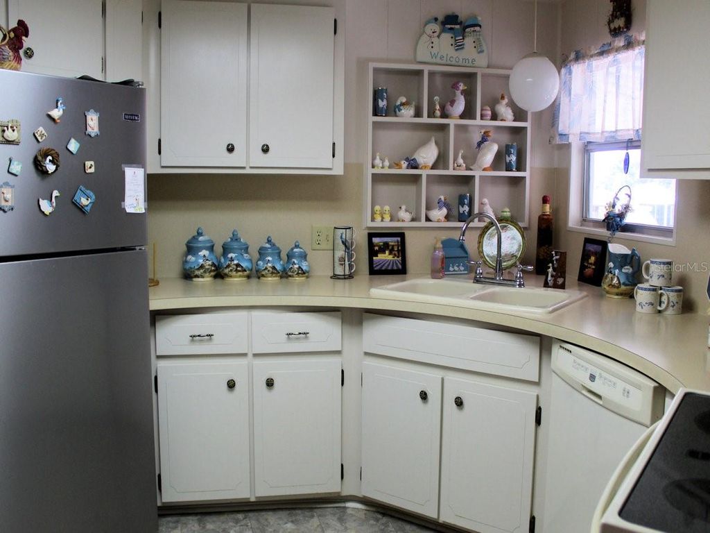 Photo of 46 Palm Forest Drive, Largo, FL 33770 (MLS # TB8449198)