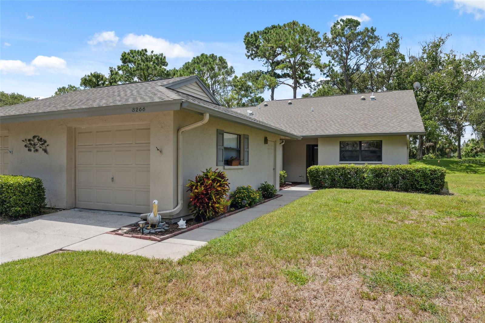 Welcome to your bright and inviting Florida retreat on the golf course fairway! This single-story gem is filled with natural light and features a spacious sunroom and outdoor patio—perfect for soaking in those serene views. Inside, the kitchen shines with granite countertops, soft-close cabinets and drawers, plus stainless steel appliances. The primary bath is beautifully updated with a fresh, modern feel.
Accessibility is built-in with ramps and an easy-flow layout. The community activity center offers 2 sparkling pools, fitness area, shuffleboard, tennis courts, pickle ball and plenty of social activities to enjoy.
Stylish, low-maintenance living including water, trash, sewer, & basic cable & internet. Enjoy with golf course views—3266 Lori Lane is ready for you!