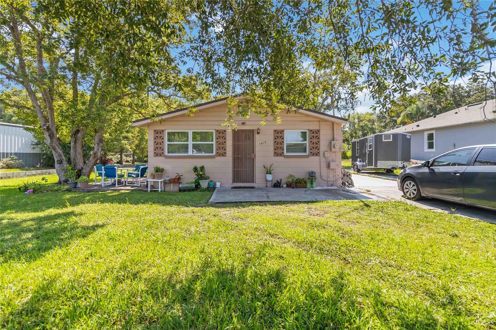 Well-located in Saint Cloud, this 3-bedroom, 1-bath home sits on over a quarter of an acre and offers both comfort and potential. With 816 square feet of living space, it features tile flooring throughout and a spacious kitchen with plenty of cabinet and counter space. The bathroom was updated in 2024, and new insulation was added throughout the home the same year, improving efficiency and indoor comfort. The large lot provides room to enjoy the outdoors, expand, or customize the space to fit your needs. Whether you're looking for your next home or a smart investment, this property offers a strong foundation in a growing area. Located just minutes from Lake Tohopekaliga, with two hospitals, grocery stores, and other daily essentials close by for added convenience. With key updates and a convenient location, this Saint Cloud home offers a great foundation and plenty of potential. Mortgage savings may be available for buyers of this listing.