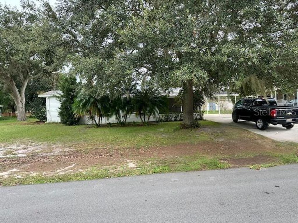 Photo of 5958 Foxhollow Drive, Winter Haven, FL 33884 (MLS # B4902074)