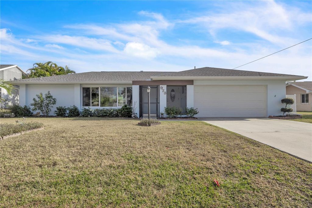 Photo of 973 Dobell Terrace NW, Port Charlotte, FL 33948 (MLS # C7519947)