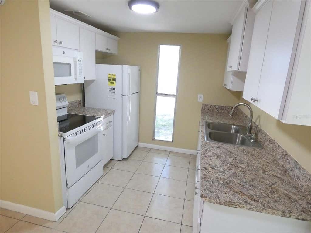 Photo of 4410 E 25th Avenue, Tampa, FL 33605 (MLS # W7888204)