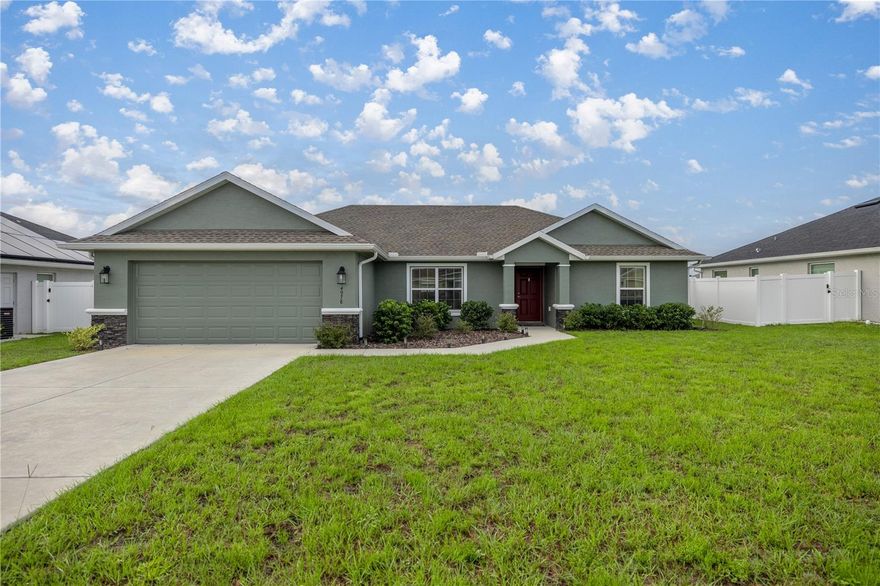 Stunning 2022-built home combining modern style, a spacious open floor plan, and thoughtful upgrades throughout! Why wait for new construction when this move-in ready home has it all? Features luxury vinyl plank flooring in every room (no carpet) for easy maintenance and a sleek look.

The open kitchen is perfect for entertaining with an island, stainless steel appliances, and beautiful wood cabinetry offering ample storage. Brushed nickel Delta fixtures, ceiling fans in every room, and double-row shelving in all closets add comfort and function.

Enjoy a private, fully fenced backyard with a 6-ft privacy fence, 10’ x 12’ covered patio, and two additional 10’ x 12’ concrete pads—ideal for seating, grilling, or an outdoor kitchen.

Additional upgrades include seamless rain gutters, extended 2-car garage (3 ft longer) with added outlets, and an electric vehicle charging outlet.

This home offers the perfect blend of comfort, style, and convenience—ideal for modern living and entertaining!