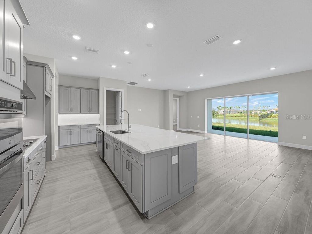 Photo of 5659 Nevis Terrace, Kissimmee, FL 34758 (MLS # O6359446)