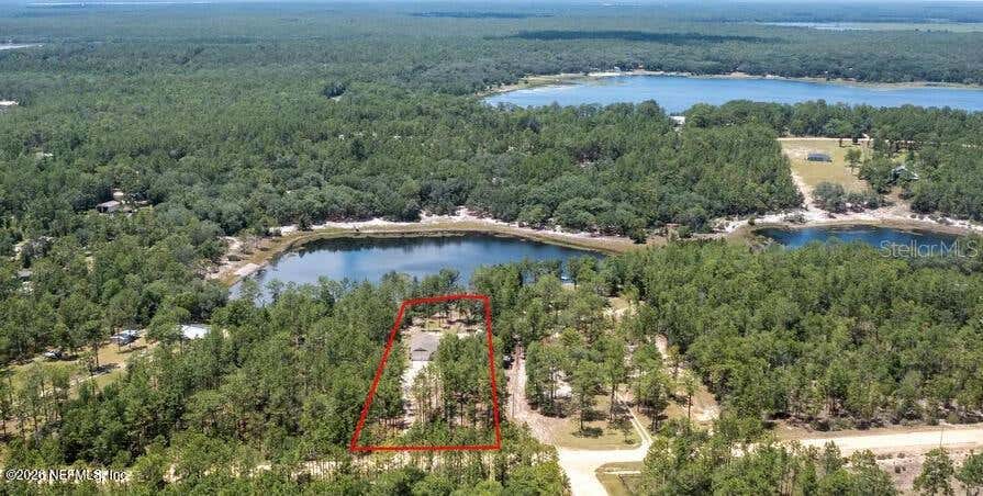 Photo of 168 Hour Glass Circle, Hawthorne, FL 32640 (MLS # GC542968)