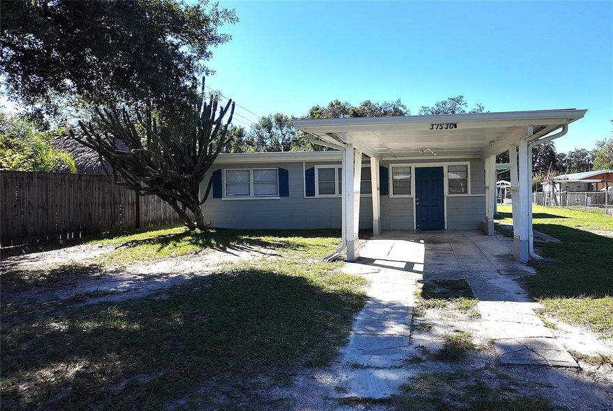 Spacious 3 bedroom 1 bath home  with screened porch and yard.  Recently remodeled.  quiet area with very little traffic.   Tucked away but convenient to Zephyrhills and Wesley Chapel.   On septic so no sewer bill.  Dogs Ok.