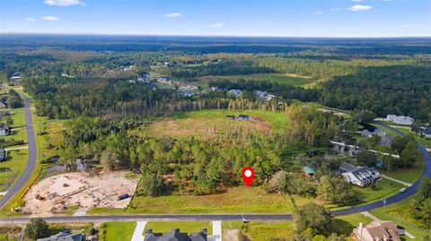 Photo of 8548 Spring Forest Lane, Wesley Chapel, FL 33544 (MLS # TB8309417)