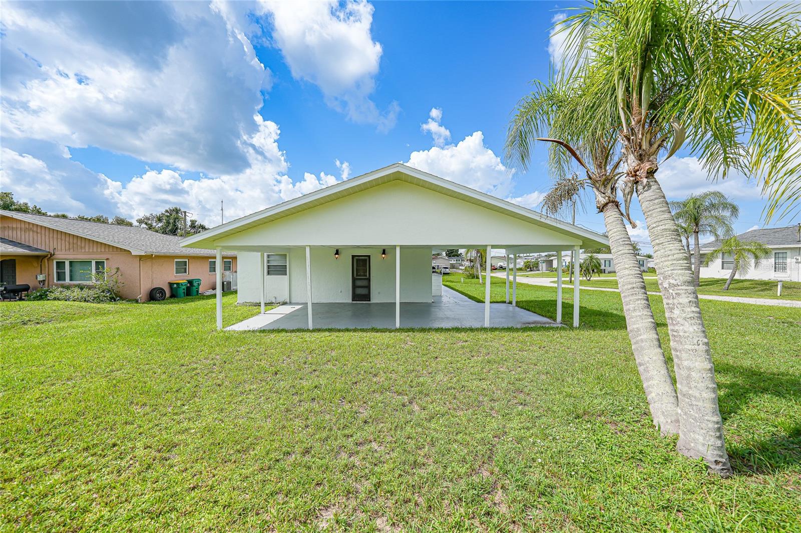 WATERFRONT with GULF ACCESS for $150,000?! Yes, really and it gets even better. This two-bedroom, one-bathroom home has been upgraded where it counts: new roof, new soffit and fascia, updated waterproof LVP flooring, new blinds, and all new well equipment with a water softener system—all the big-ticket items have been handled! Inside, it’s a blank canvas just waiting for your vision. With some fresh paint, updated countertops, and cabinets, this place will shine. Whether you're an investor, snowbird, or weekend water warrior, this is your chance to own a piece of the Florida waterfront lifestyle without breaking the bank. Located just minutes from downtown Punta Gorda, this home sits on a canal with access to Jim Long Lake, Peace River, Charlotte Harbor, and the Gulf of Mexico. That’s right: boating, fishing, kayaking, and full-on salt life is all right here in your backyard. Convenient to beaches, restaurants, golf courses, I-75, and nearby airports, this location is hard to beat. At this price, homes like this don’t last long—schedule your private tour today and imagine the possibilities!