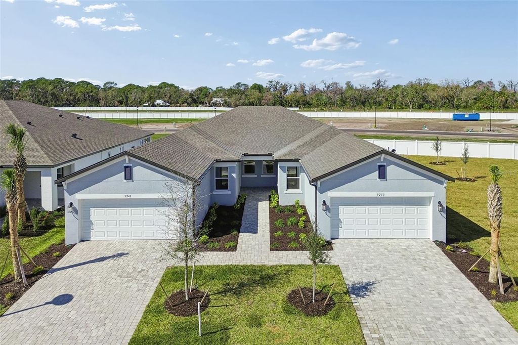 Photo of 9253 Optimist Way, Palmetto, FL 34221 (MLS # R4910700)