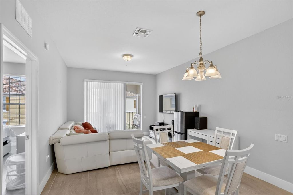 Photo of 3332 Robert Trent Jones Drive #40203, Orlando, FL 32835 (MLS # O6406784)