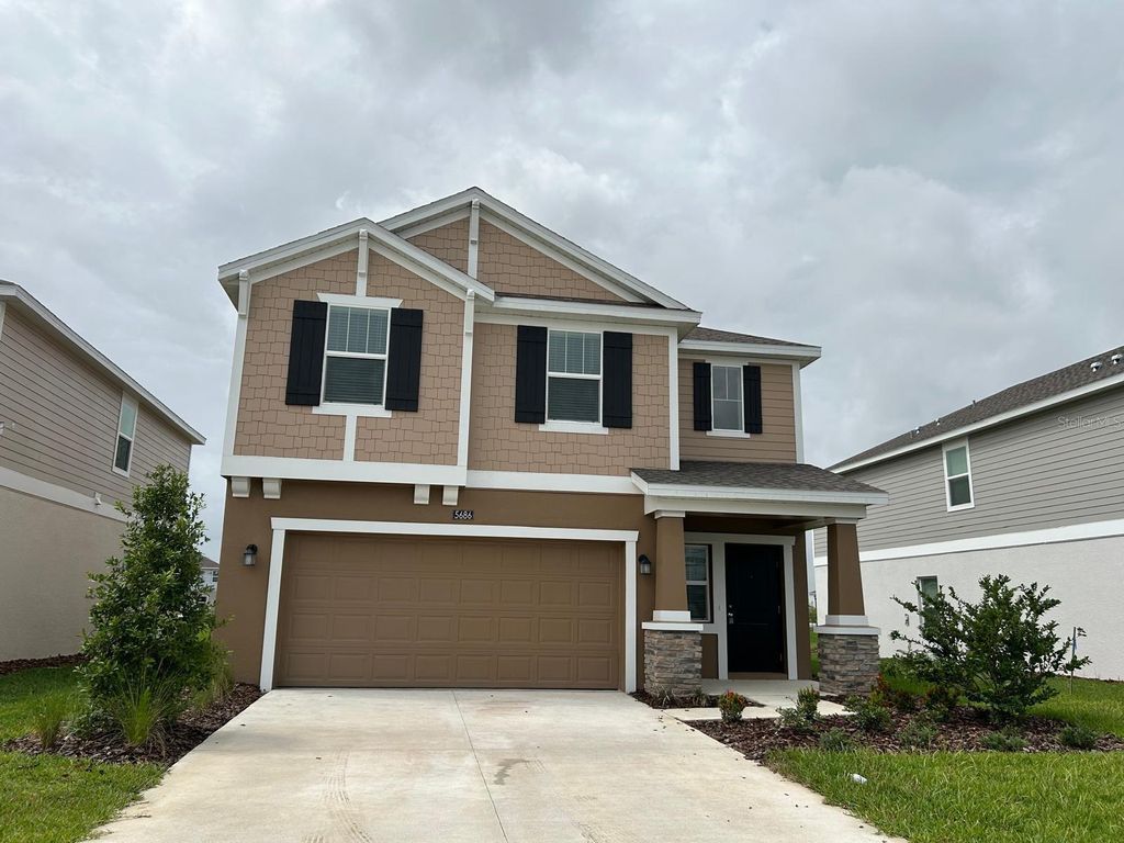 Photo of 5686 Portico Place, Kissimmee, FL 34758 (MLS # O6319933)