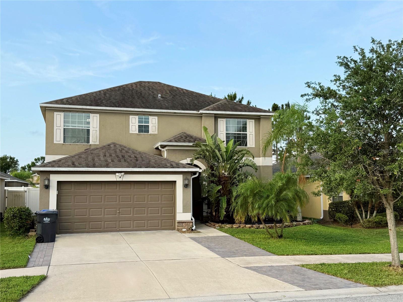 Spacious Former Model Home with Upgrades in a Resort-Style Community. Step into comfort and style in this beautifully appointed 4-bedroom, 2.5-bath former model home offering 2,491 sq. ft. of living space. Thoughtfully designed with custom touches throughout, this home features soaring ceilings, crown molding, and elegant tile flooring across the first-floor living areas. The gourmet kitchen is a chef's dream, showcasing granite countertops, stainless steel appliances including a newer refrigerator and abundant cabinet space. A formal living room and separate family room provide plenty of space for entertaining or relaxing with friends and family. Upstairs, the oversized primary suite offers generous closet space and a luxurious en-suite bath complete with dual granite vanities, a garden tub, and a walk-in shower. All secondary bedrooms are spacious and filled with natural light. Enjoy Florida living year-round from the fully screened lanai overlooking the beautifully landscaped and fully fenced backyard perfect for outdoor lounging and play. Located in a vibrant community packed with amenities including a resort-style pool, clubhouse, fitness center, basketball courts, and playground. Conveniently situated near the growing Riverview/Wimauma corridor with easy access to I-75, Southshore Bay Lagoon, Cypress Creek Golf Course, E.G. Simmons Conservation Park and Boat Ramp, Bahia Beach, shopping, and award-winning restaurants. Available for immediate move-in. Pets welcome with a non-refundable $250 pet fee. Don't miss your chance to call this stunning, move-in-ready home your own!