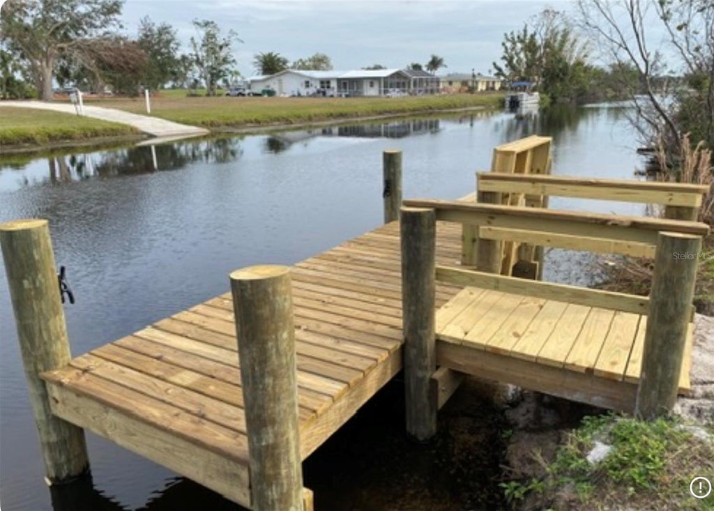 Photo of 108 Boundary Boulevard #B, Rotonda West, FL 33947 (MLS # C7530239)