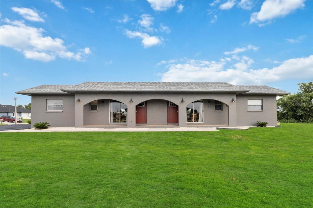 Photo of 108 Boundary Boulevard #B, Rotonda West, FL 33947 (MLS # C7530239)
