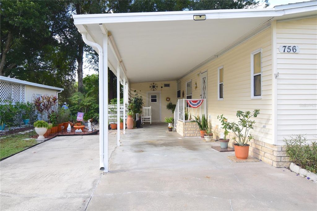 Photo of 756 Princess Palm Place, Oviedo, FL 32765 (MLS # O6352467)