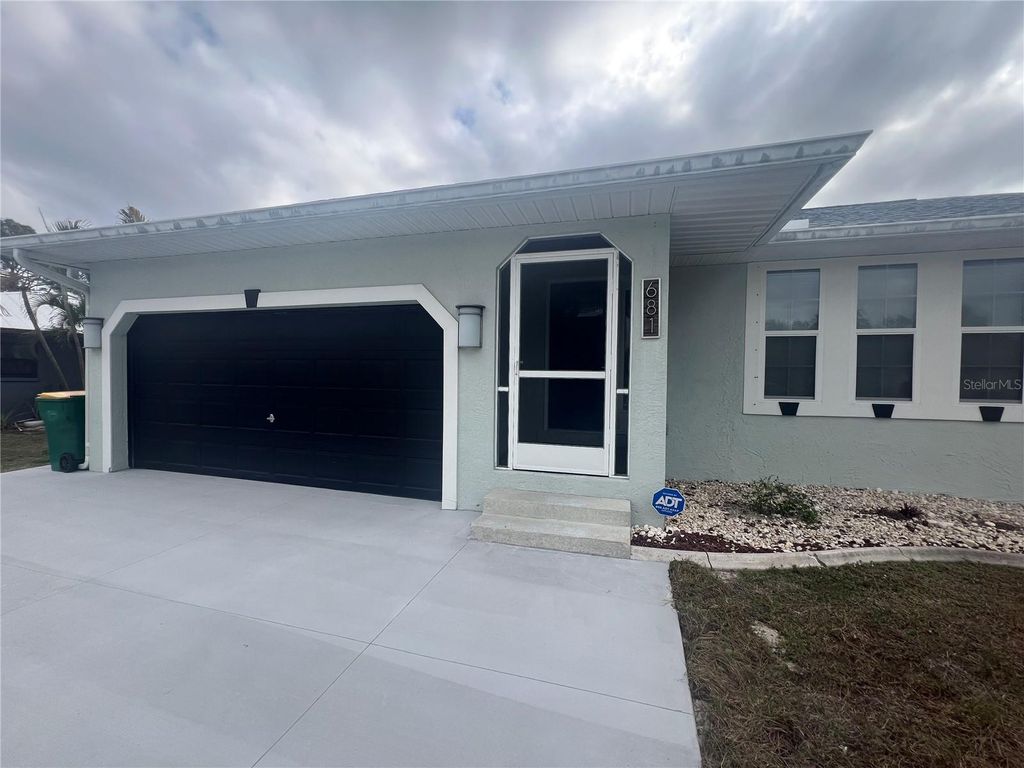 Photo of 681 Verona Street, Port Charlotte, FL 33948 (MLS # C7518967)