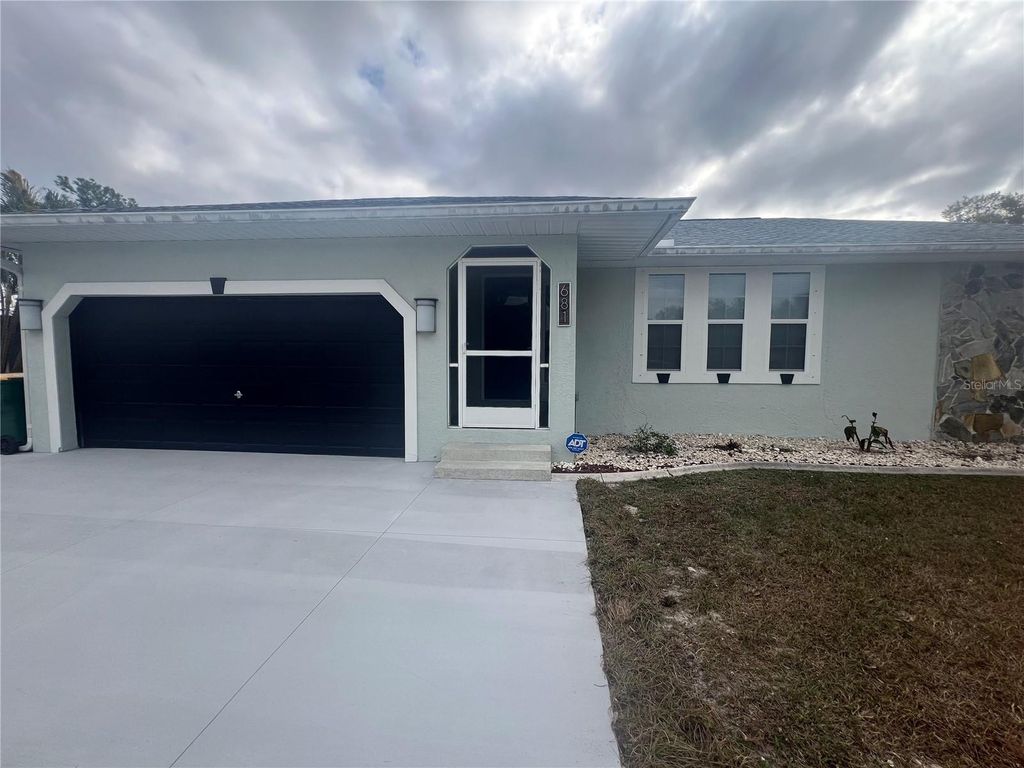 Photo of 681 Verona Street, Port Charlotte, FL 33948 (MLS # C7518967)