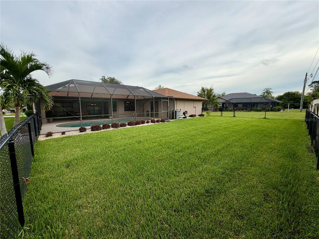 Photo of 23411 Mullins Avenue, Port Charlotte, FL 33954 (MLS # C7531947)