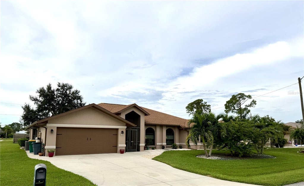 Photo of 23411 Mullins Avenue, Port Charlotte, FL 33954 (MLS # C7531947)