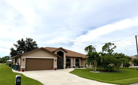 Photo of 23411 Mullins Avenue, Port Charlotte, FL 33954 (MLS # C7531947)