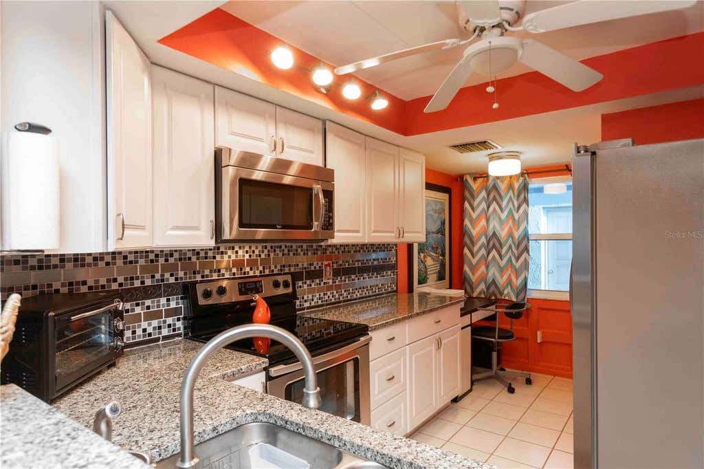 Photo of 9639 Greenskeeper Drive #9639, New Port Richey, FL 34655 (MLS # W7885279)