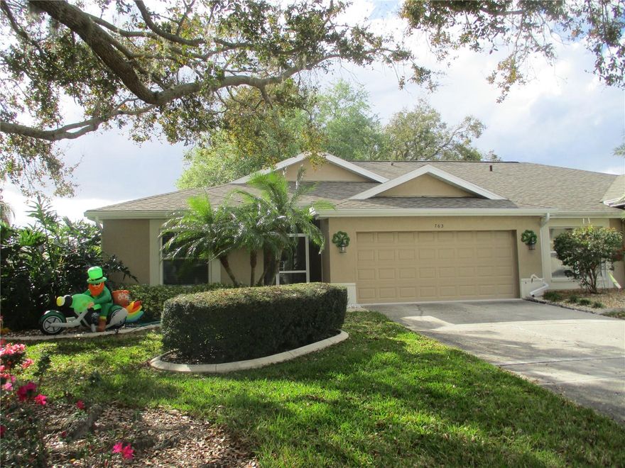 ANNUAL LEASE ONLY.  AVAILABLE 4/15/26.  Enjoy retirement living in this lovely two bedroom, 2 bath, 2 car garage condo located in the premier senior community of Kings Point.  There is plush carpet in the living room, dining room and bedrooms with ceramic tile in the entry, kitchen and both bathrooms.  The kitchen is equipped with a French door refrigerator with water and ice in the door, ceramic top stove, built in microwave, dishwasher, closet pantry and disposal as well as an eating area.  The master bedroom/bath has a walk in closet and wall closet, step in shower with grab bar, dual sinks and plant shelves.  The hall bath has a tub with shower and grab bar.  The bonus room is perfect for crafts, sewing or painting.  Central heat and air as well as ceiling fans in the living room, kitchen, bonus room and both bedrooms will keep you comfortable all year round.  Enjoy the screened lanai in the cooler weather.  Cable TV, internet, water, pest control and lawn care are included in the rent as well as the use of all amenities offered in Kings Point.  Sorry, no pets and no smoking.