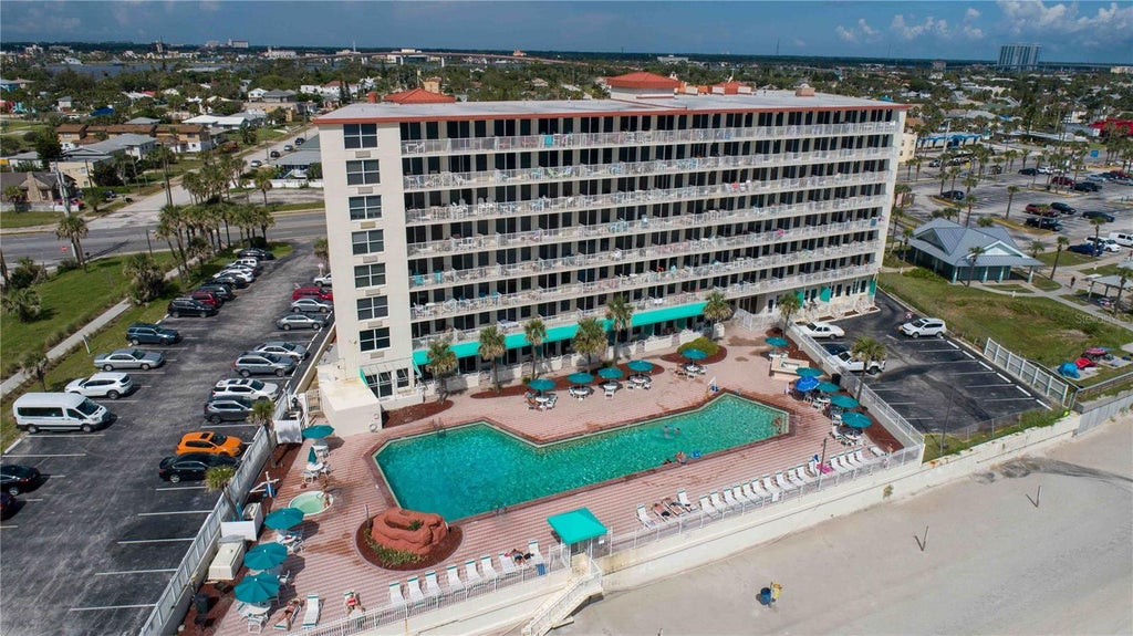 Photo of 701 S Atlantic Avenue #402, Daytona Beach, FL 32118 (MLS # V4950734)