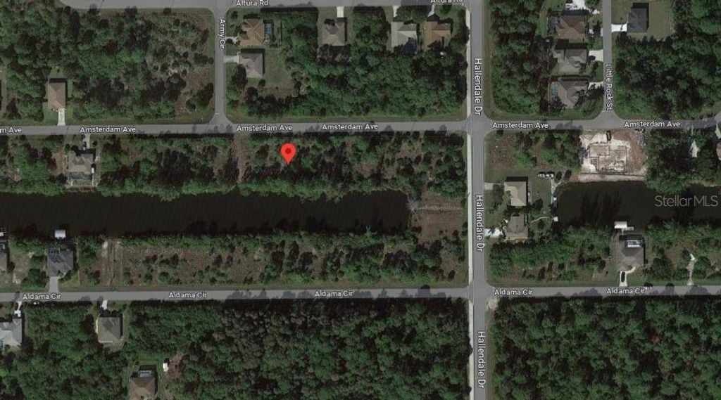 Photo of 15189 Amsterdam Avenue, Port Charlotte, FL 33981 (MLS # O6141393)