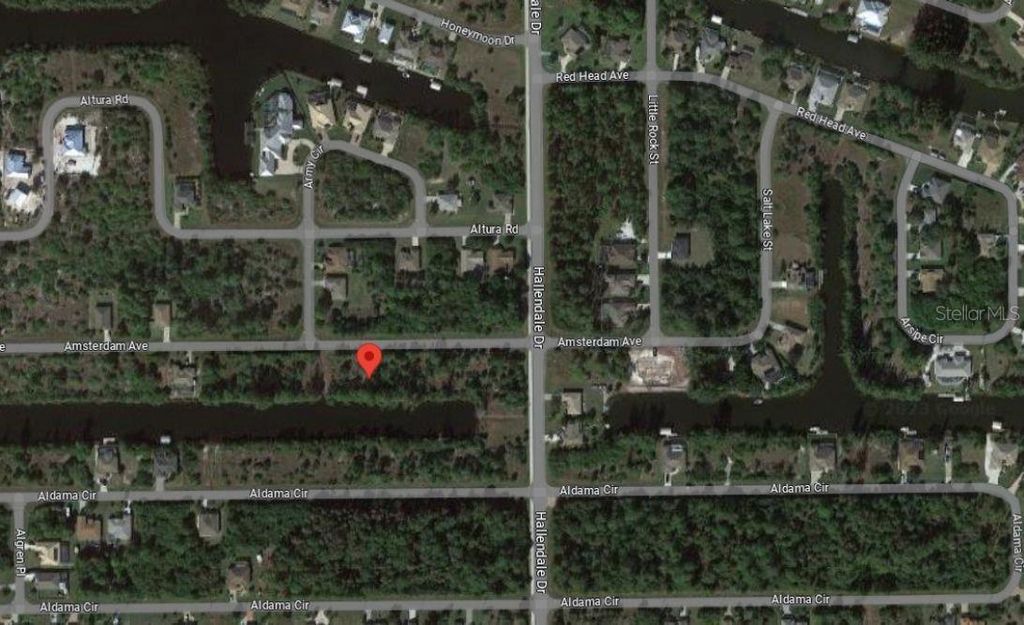 Photo of 15189 Amsterdam Avenue, Port Charlotte, FL 33981 (MLS # O6141393)