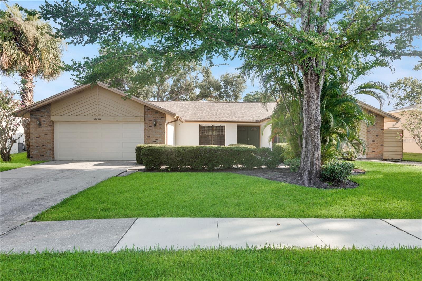 Welcome to this stunning 4 bedroom, 2 bathroom home, perfectly designed for the ultimate in comfort and entertainment! Located in the highly sought-after Palm Harbor School district, this beautiful property is a must-see for anyone looking for a spacious and stylish retreat. The master suite is a serene oasis, complete with a spacious walk-in closet, dual sinks, a relaxing garden tub, and a separate shower. One of the bedrooms is ideal for a home office or study, providing a quiet and productive space to get work done. The kitchen has been updated with newer SS appliances, granite countertops, and a spacious eat-in kitchen perfect for cooking up a storm, with a breakfast nook overlooking the beautiful backyard and large lanai, perfect for al fresco dining or enjoying a morning coffee. With porcelain tile flooring in high-traffic areas for easy maintenance, newer, cleaned carpet flooring in all bedrooms for a cozy feel, an inside laundry room with storage closet for added convenience, and separate living and family rooms with access to the screened-in lanai, this home has it all. Plus a formal dining area as well! Convenient Location & Amenities Galore!
Within a 5-minute stroll, you'll find a vibrant community hub featuring a public library for bookworms and lifelong learners, a sports enthusiast's paradise with soccer and baseball fields, a batting cage, tennis and pickleball courts, and a jungle gym/kids playground for the little ones. A Two minute drive to Sprouts and Trader Joe's!! Just a short drive away, enjoy the sun-kissed beaches and convenient access to airports. We welcome small dogs (sorry, no aggressive breeds) and feline friends. Per Homeowners association. No trailers, no advertised vehicles. Tenant is responsible for all utilities, lawn and pest care.