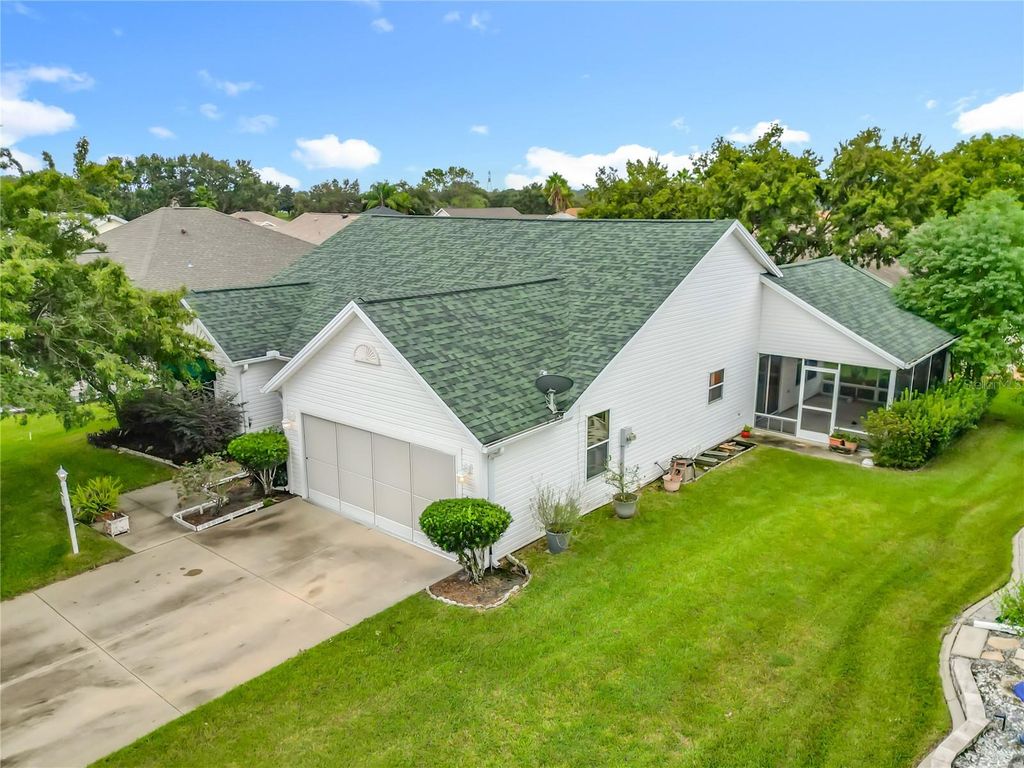 Photo of 1506 Dellano Way, Lady Lake, FL 32159 (MLS # TB8436860)