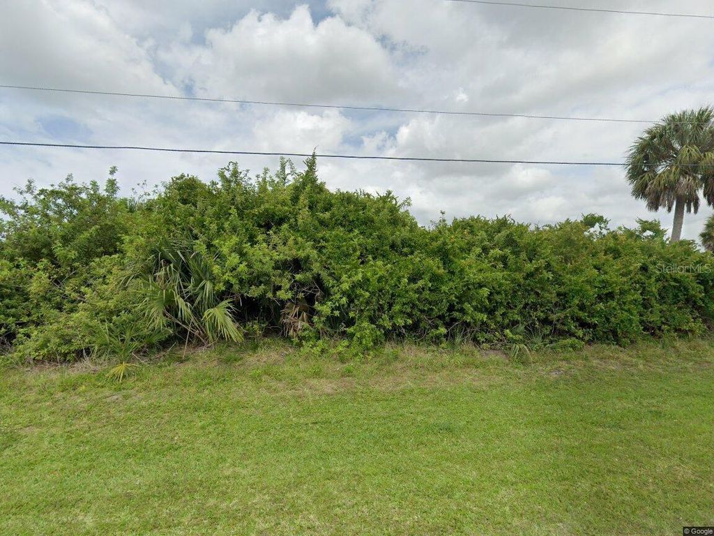 Photo of 153 Spring Drive, Rotonda West, FL 33947 (MLS # C7516119)