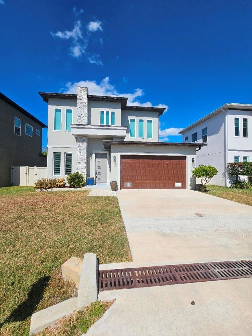 Welcome home to this freshly painted, beautifully maintained, modern 4 bedroom, 2.5 bath home with a 2 car garage in South Tampa built in 2019! As you enter, you enter into the formal dining room. This home features porcelain flooring as well as master suite with spacious master bathroom with a frameless glass shower and soaking tub and closet on the a first floor! The kitchen boasts quartz counter tops with stainless steel appliances, European cabinetry and a breakfast bar in the island. You can relax in the living room without having to close the blinds as there are NO backyard neighbors and the yard is completely fenced with privacy, vinyl fencing. There is a half bath and laundry room on the first floor as well. Upstairs you will find 3 more spacious bedrooms with luxury vinyl plank flooring and a bathroom with porcelain flooring. The bathroom also has quartz counter tops and glass shower.  There are so many high end, modern finishes in this home, it's amazing! Location of this home is also perfect! So close to MacDill AFB, major shopping, restaurants & highways. Basic lawn care is included. Applicants must have a credit score of 600 or better and must make 3x the rent in Net Income. All adults must apply separately. Pets must be approved prior to applying. Rent, Non-refundable Pet Fee (if applicable) and Administrative Fee of $125 are due on the day of move in.