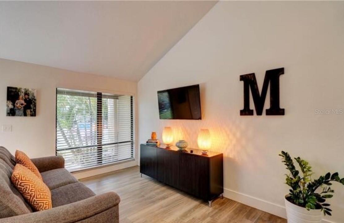 Spacious 2B/2B townhouse in the quiet, well-maintained community of Pine Grove. Featuring an open concept living and dining area with modern kitchen, infinity granite counter tops, on-site laundry and new flooring on second floor. The primary bedroom located in the first floor boasts sliding doors overlooking the private fenced courtyard -perfect for relaxing and enjoying the weather, a spacious walking closet and primary bathroom with shower. Upstairs you'll find a loft area with abundant natural light -perfect for an afternoon read, the second bedroom host an in-built closet and the bathroom offers a tub/shower combo. GREAT LOCATION! Located just five (5) minutes from Bell Tower, Target, Publix, movie theater, schools restaurants and more. Vibrant downtown Fort Myers and Ft. Myers Beach are just fifteenth (15) minutes away. New roof (2024), impact resistant glass doors, pet-friendly unit with two (2) parking spots just steps from the front door. Perfect for anyone starting a family or living the Salt life.