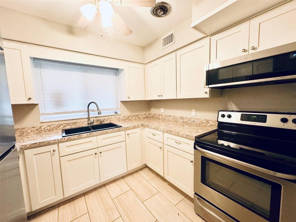 Photo of 1619 Pinewood Drive, Clearwater, FL 33756 (MLS # TB8487530)