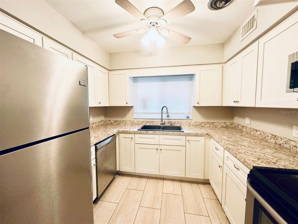 Photo of 1619 Pinewood Drive, Clearwater, FL 33756 (MLS # TB8487530)