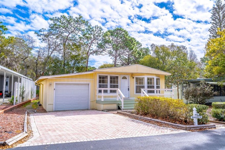 Welcome home to a simpler, sweeter way of living in the Forest 55+ Community in the heart of Lake Mary. This charming 2-bedroom, 2-bath home offers the perfect balance of comfort, convenience, and connection—ideal for those ready to downsize without giving up warmth or lifestyle.  The location makes everyday life easy and enjoyable. You’re within walking distance to shopping, restaurants, and the post office, just one mile to I-4, minutes to downtown Lake Mary, and a short drive to Central Florida beaches and attractions—close to everything, yet peacefully tucked into a welcoming neighborhood.  Inside, the home feels light, open, and inviting, with 1,260 square feet designed for relaxed living. The spacious living room, complete with a cozy fireplace and built-in bookshelves, is the perfect place to unwind, read, or gather with friends. The wide, comfortable kitchen offers plenty of space for everyday meals, a casual eating area, and room for a more formal dining setup when hosting family.  The home features laminate flooring throughout with ceramic tile at the entry, keeping things easy to maintain and worry-free. A one-car garage and an enclosed laundry room with extra storage, conveniently connected behind the garage, provide the practical touches that make life simpler.  Outdoor spaces invite you to slow down and enjoy the Florida lifestyle. Relax on the screened rear patio, enjoy quiet afternoons on the Trex-style backyard deck, or sip morning coffee on the brand-new front wood deck, where neighbors often stop to say hello. The easy-care lot means less upkeep and more time to enjoy what matters most. The roof was replaced in 2016, offering added peace of mind.  Life in The Forest is about community and connection. Residents enjoy a beautiful clubhouse, two swimming pools (one heated year-round), hot tub, men’s and women’s saunas, shuffleboard, pickleball and tennis courts, along with billiards, poker, craft and library rooms. With weekly activities and monthly social events, it’s easy to stay active, meet new friends, and feel right at home.  This is more than just a house—it’s an opportunity to downsize comfortably, live simply, and enjoy a lifestyle filled with ease, friendships, and peace of mind in one of Lake Mary’s most beloved 55+ communities.