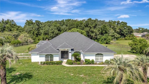 Photo of 6856 NE 61st Avenue Road, Silver Springs, FL 34488 (MLS # OM731099)